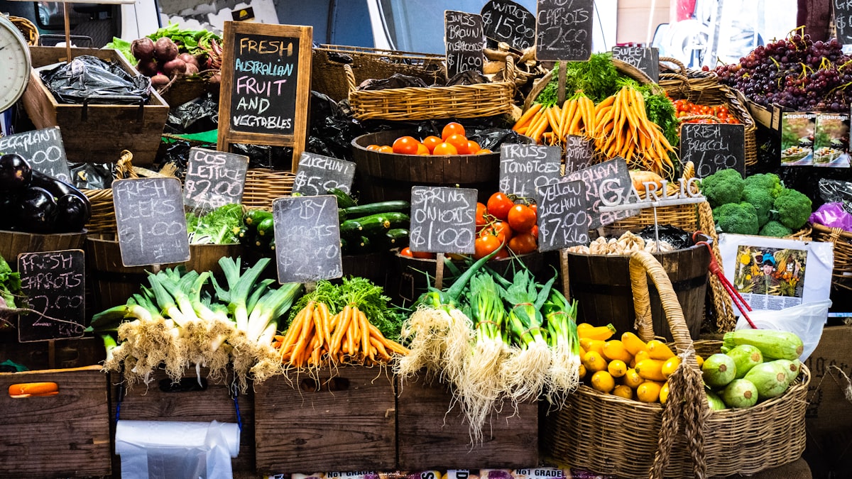 Colorful array of fresh seasonal vegetables and herbs